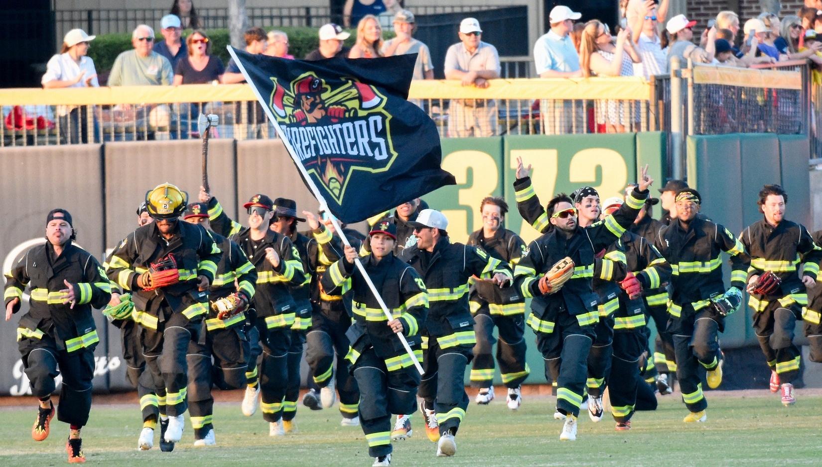 Val Perez leads the firefighters